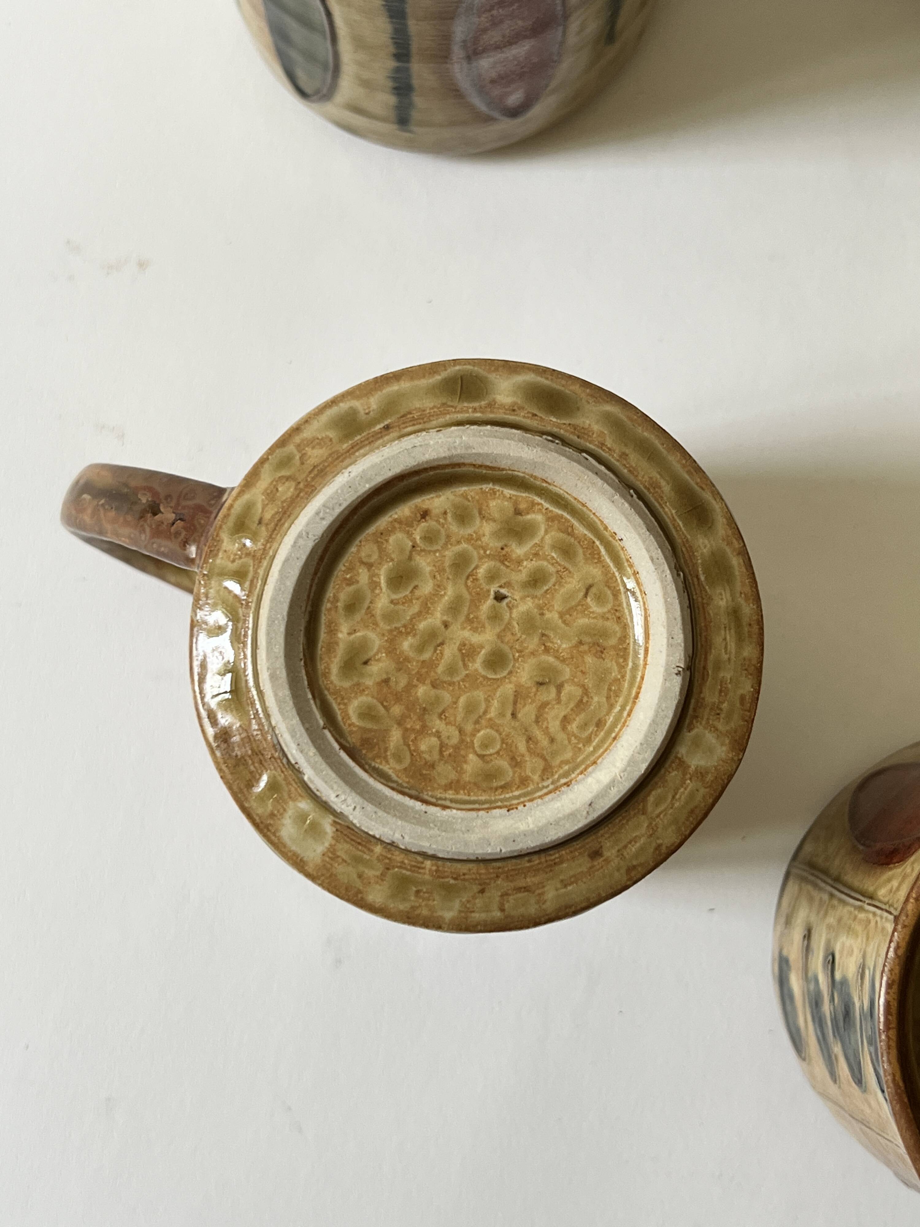 Set of 4 glazed ceramic coffee cups, circa 1970