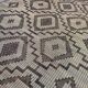 Vintage Touareg mat made of leather and reeds.