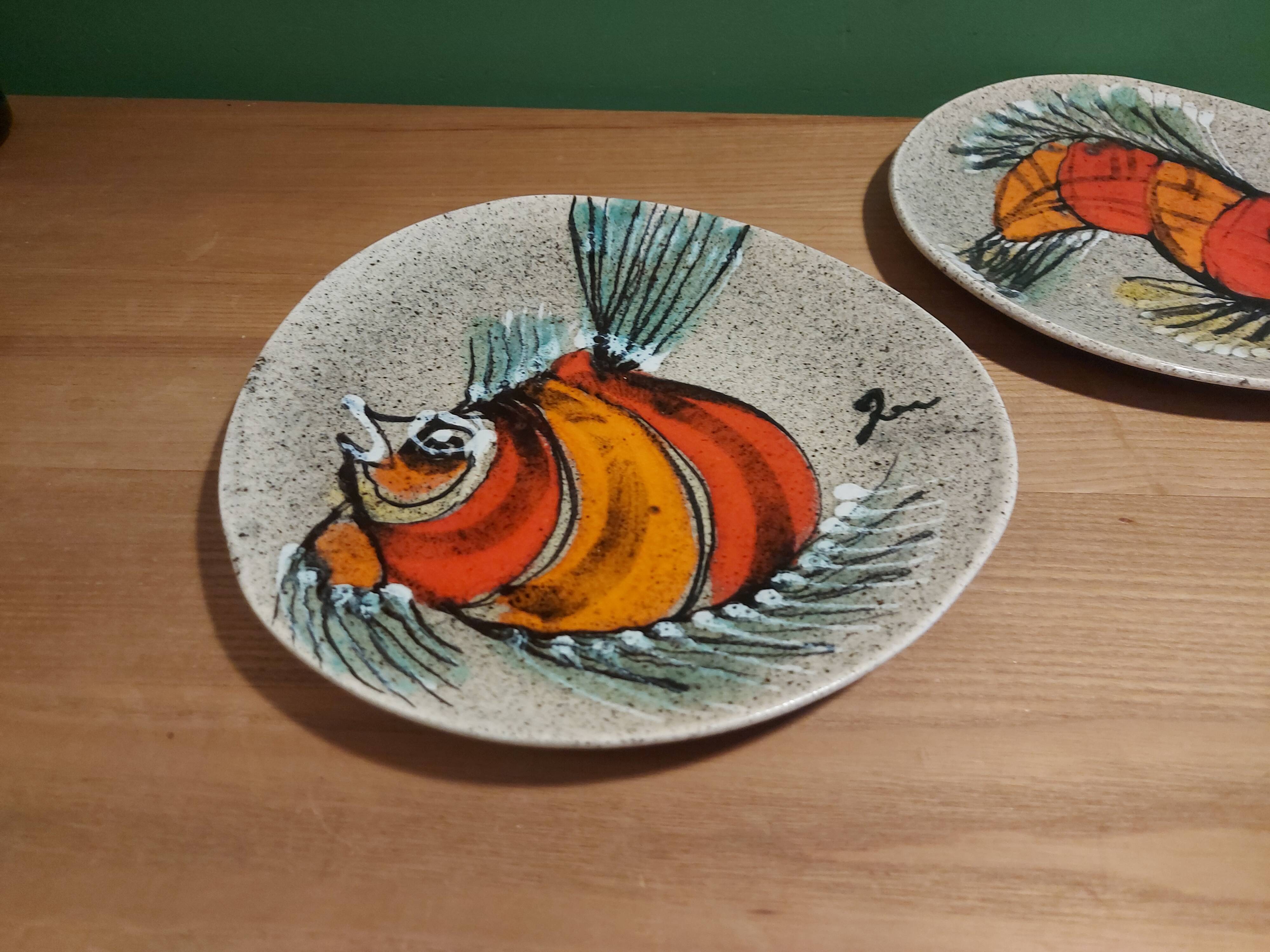 2 vintage ceramic plates with fish decoration