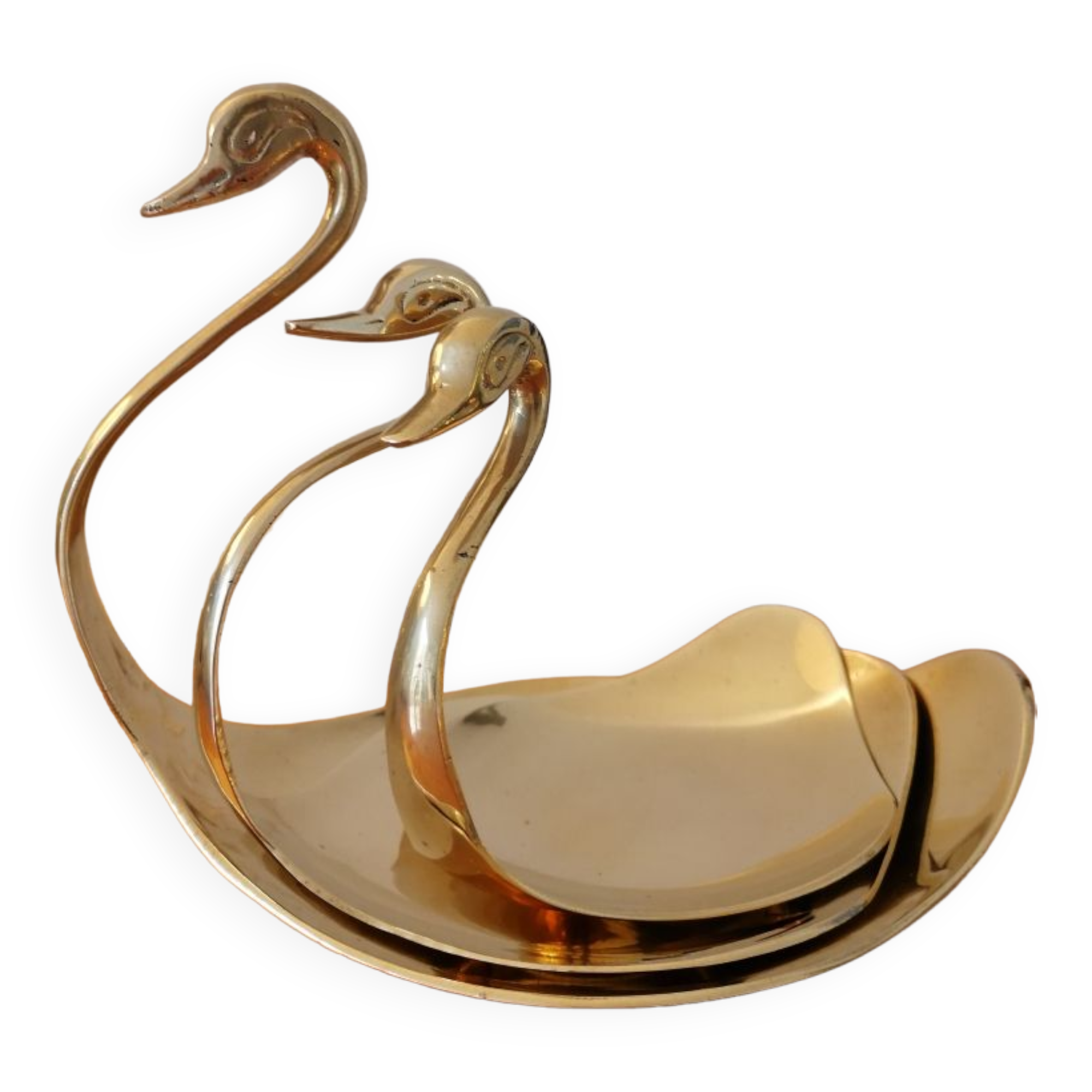 Empty brass swan pocket