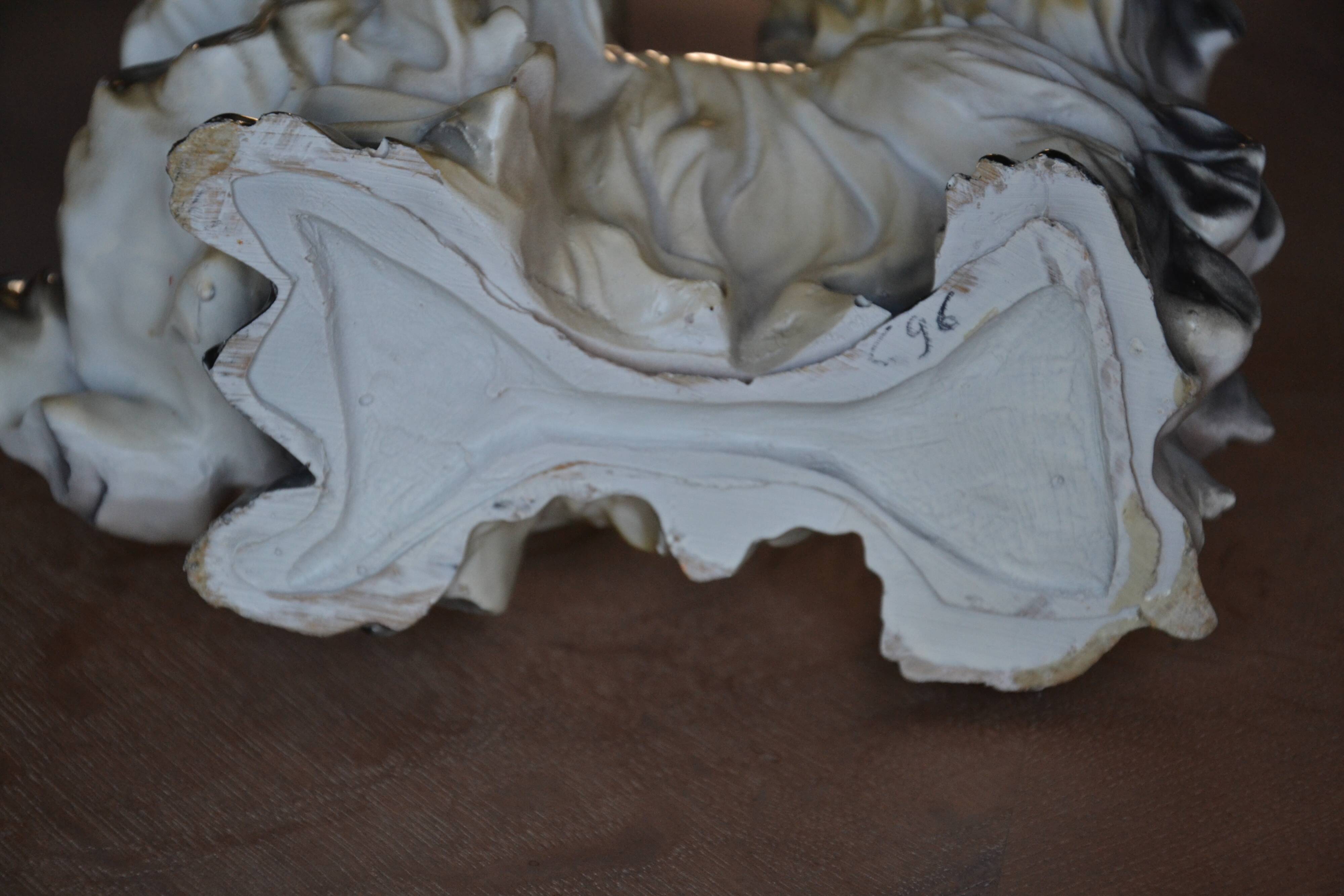 Ceramic dog sculpture from the 1940s-50s.
