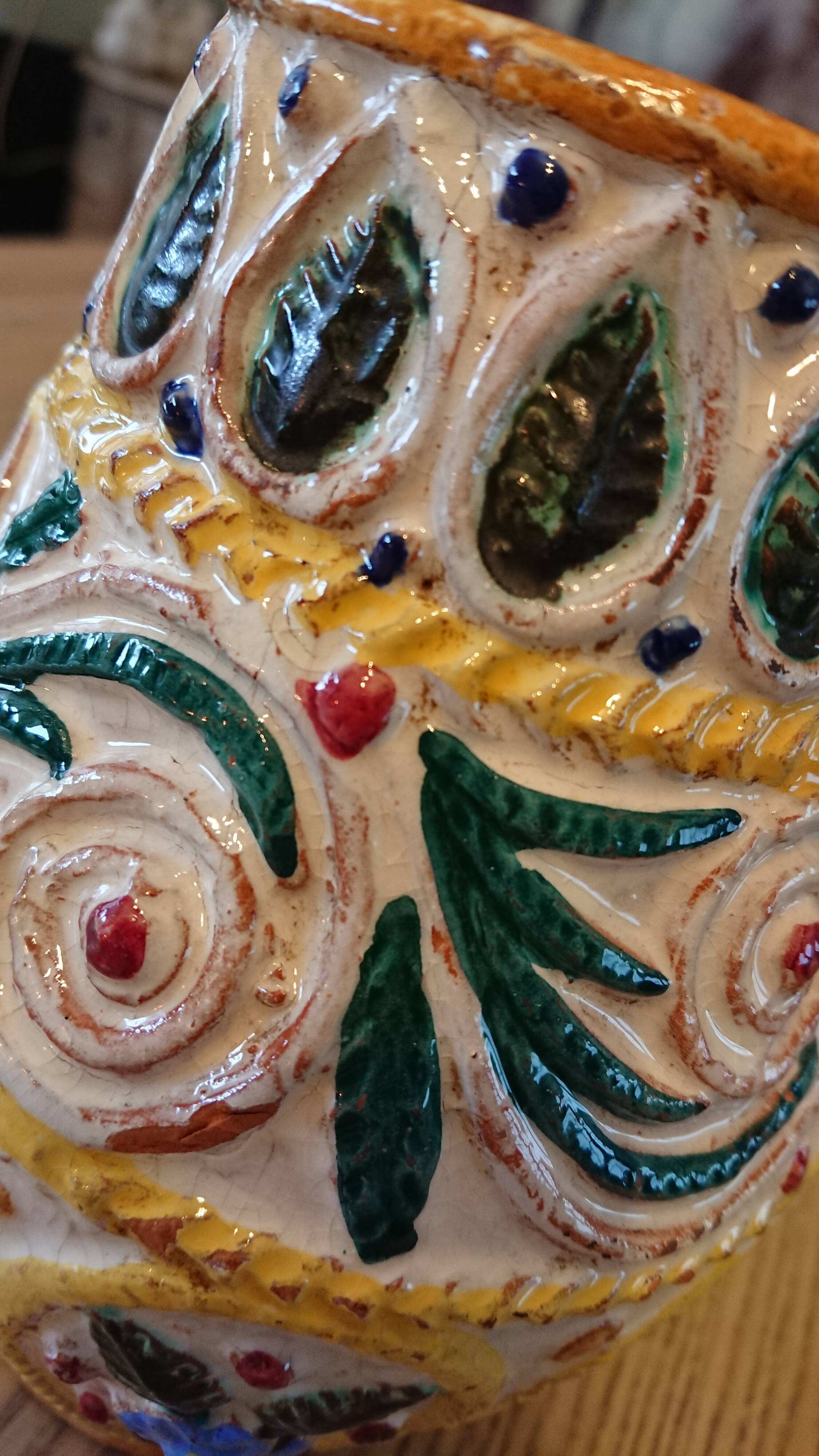 Hand-carved and hand-painted vase