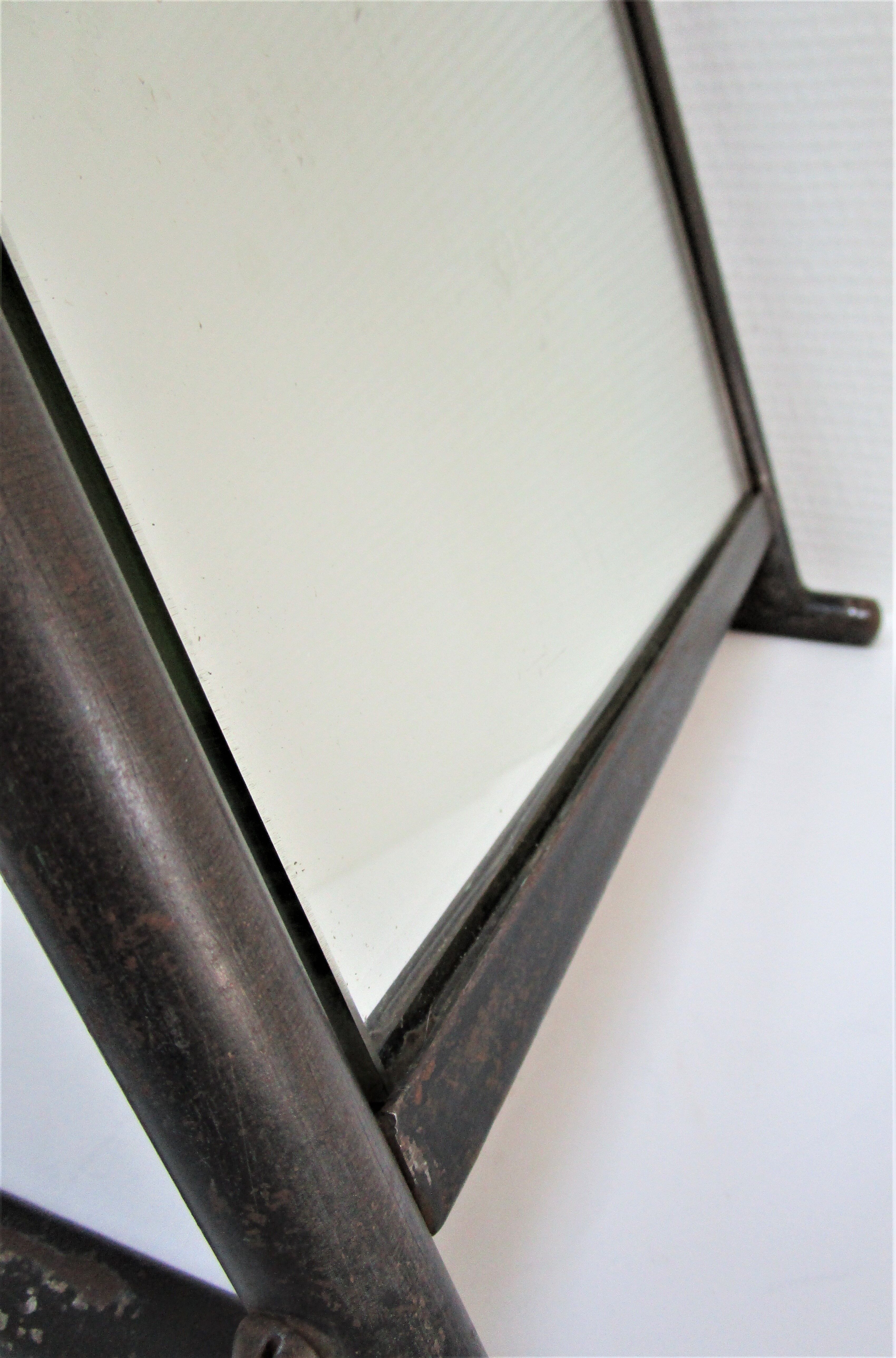 Vintage patinated metal shoe mirror