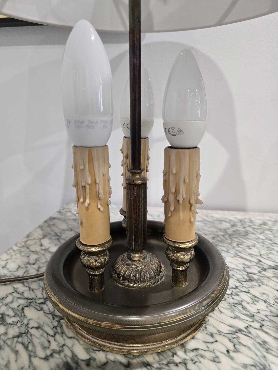 Three-armed brass hot water bottle lamp with empire green shade