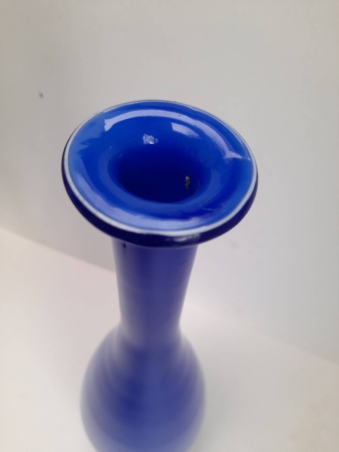 Large bottle vase in bright blue opaline.