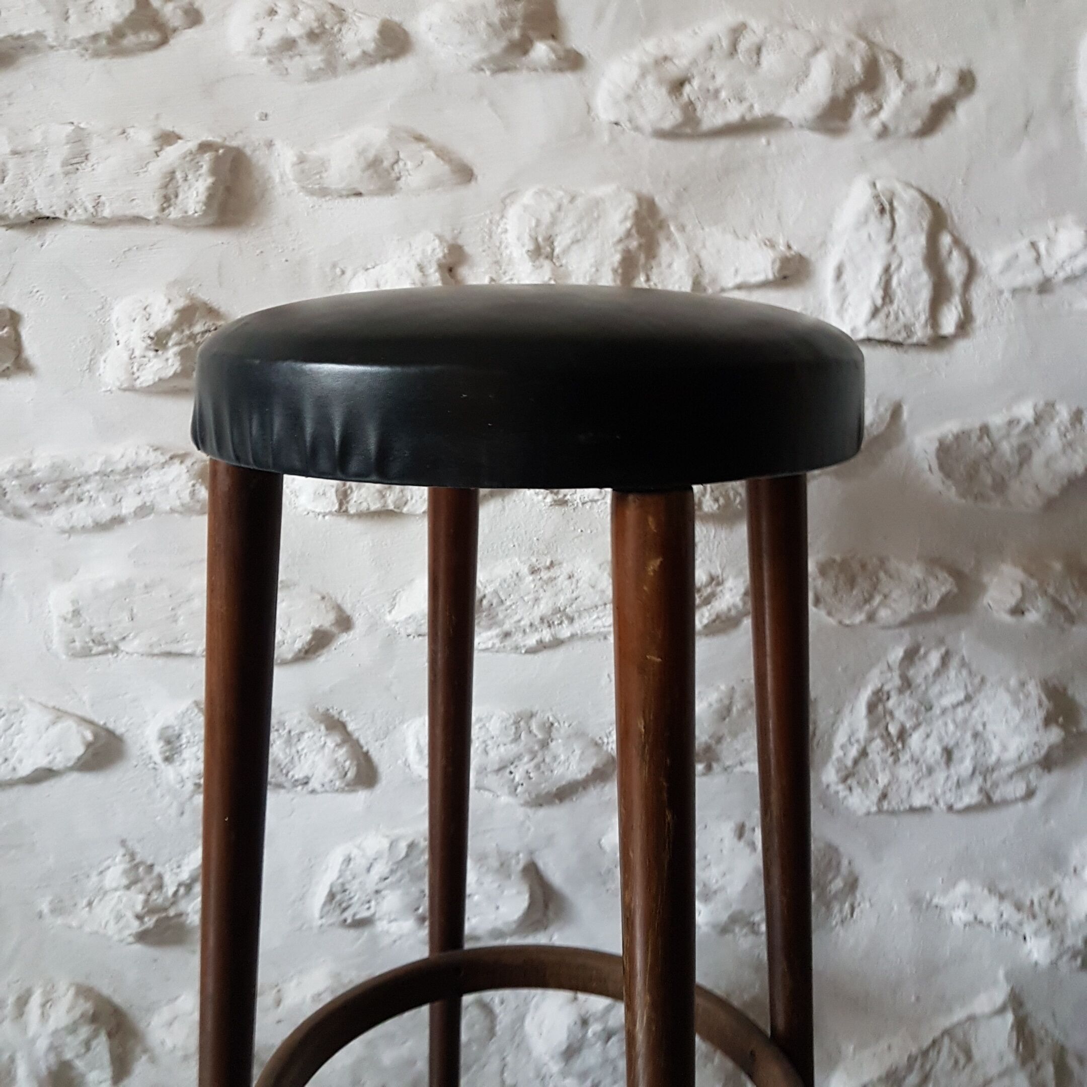 High wooden stool