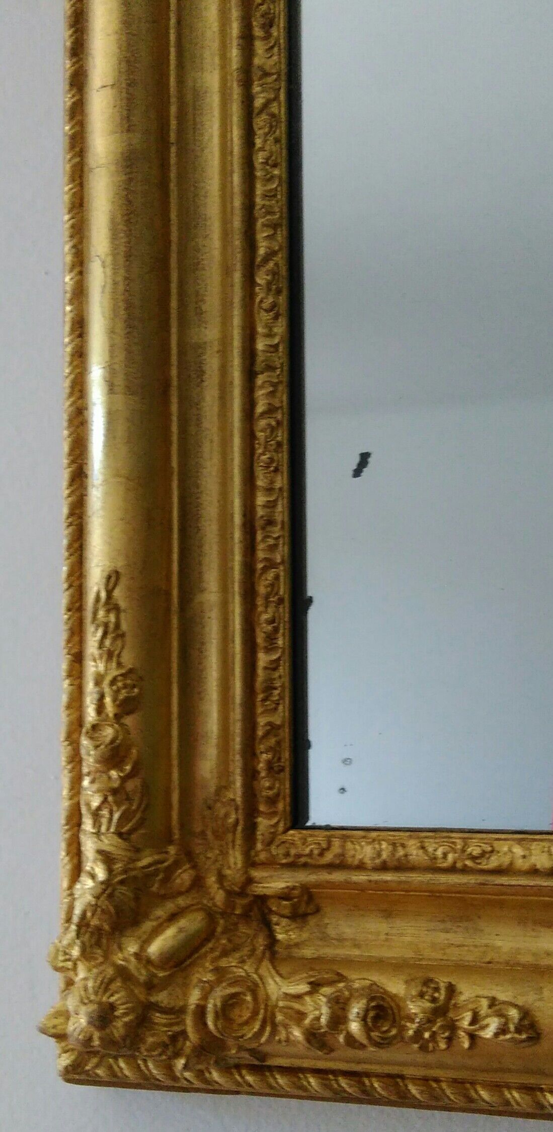 Golden romantic mirror with gold leaf