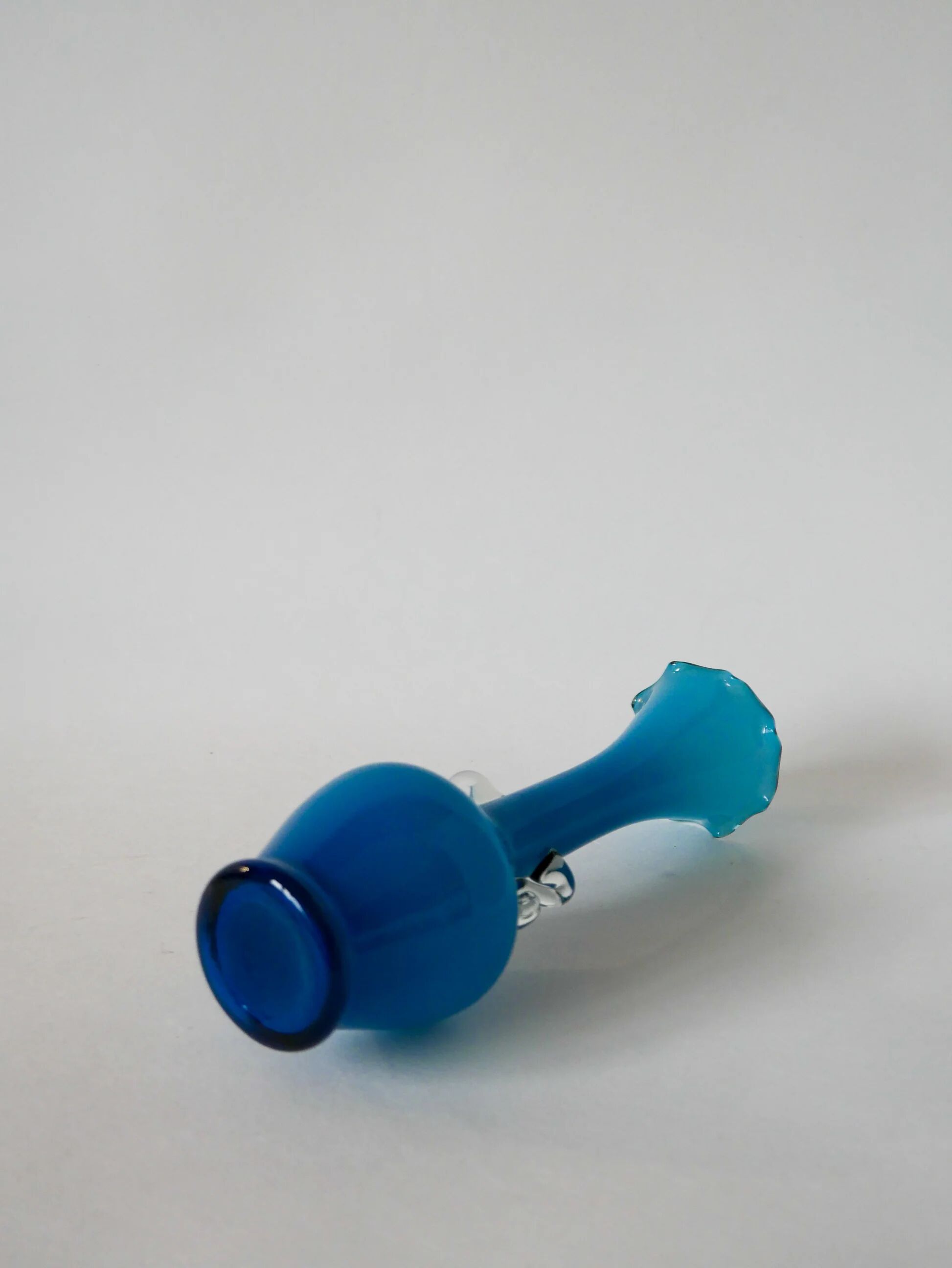 Sky blue opaline vase with scalloped edges and small handles, design from the 1960s.