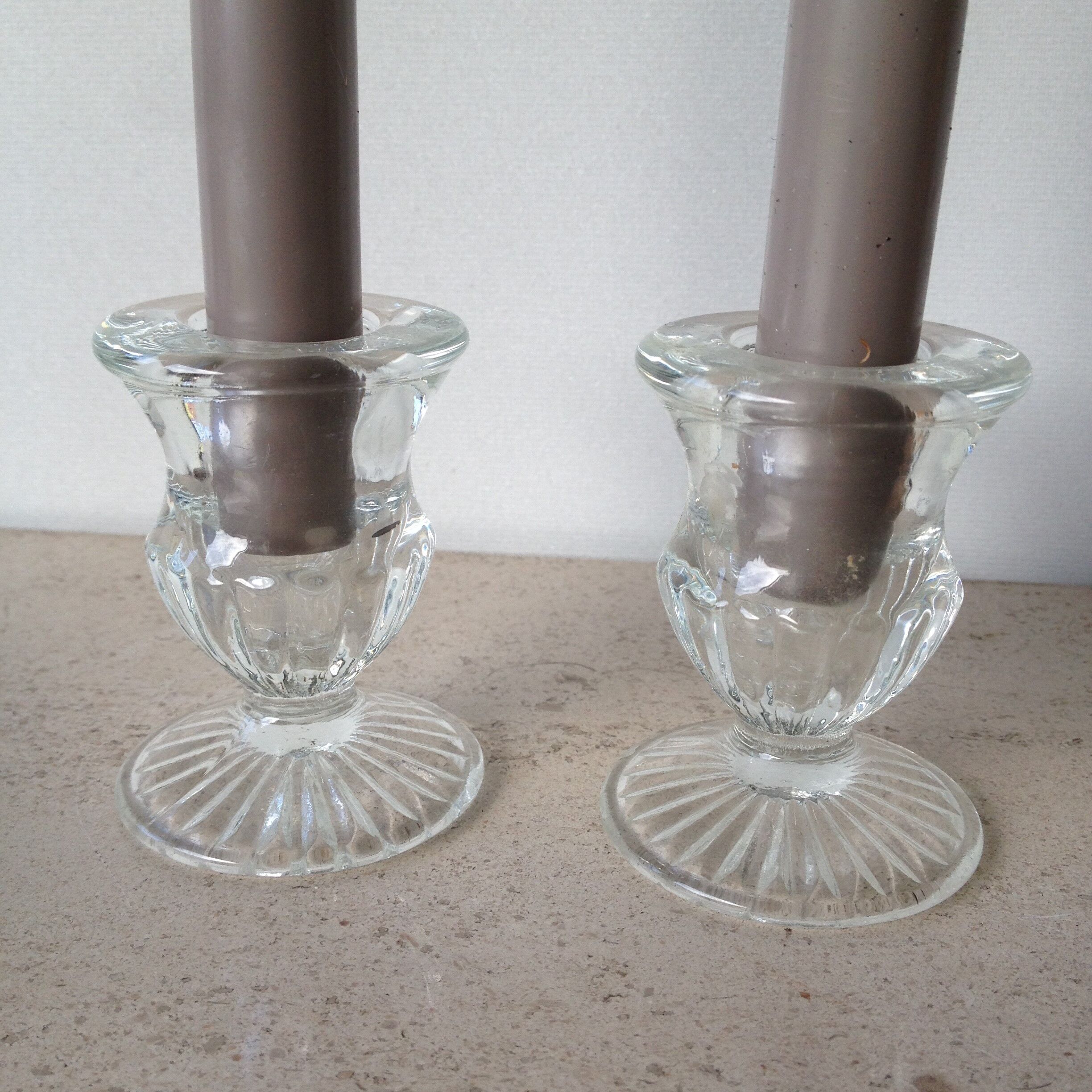 Pair of old glass candlesticks