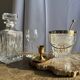 Small golden hand candlestick with a round loop handle D8 H6.5