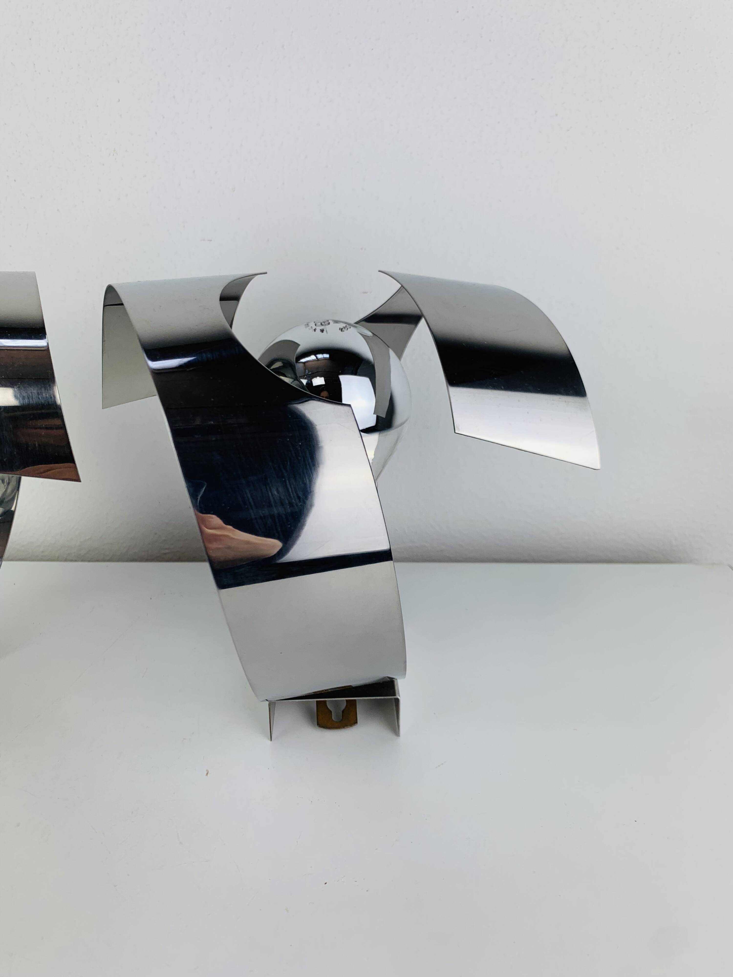 Pair of chrome spiral wall lights from the seventies/Space Age, 1970s.