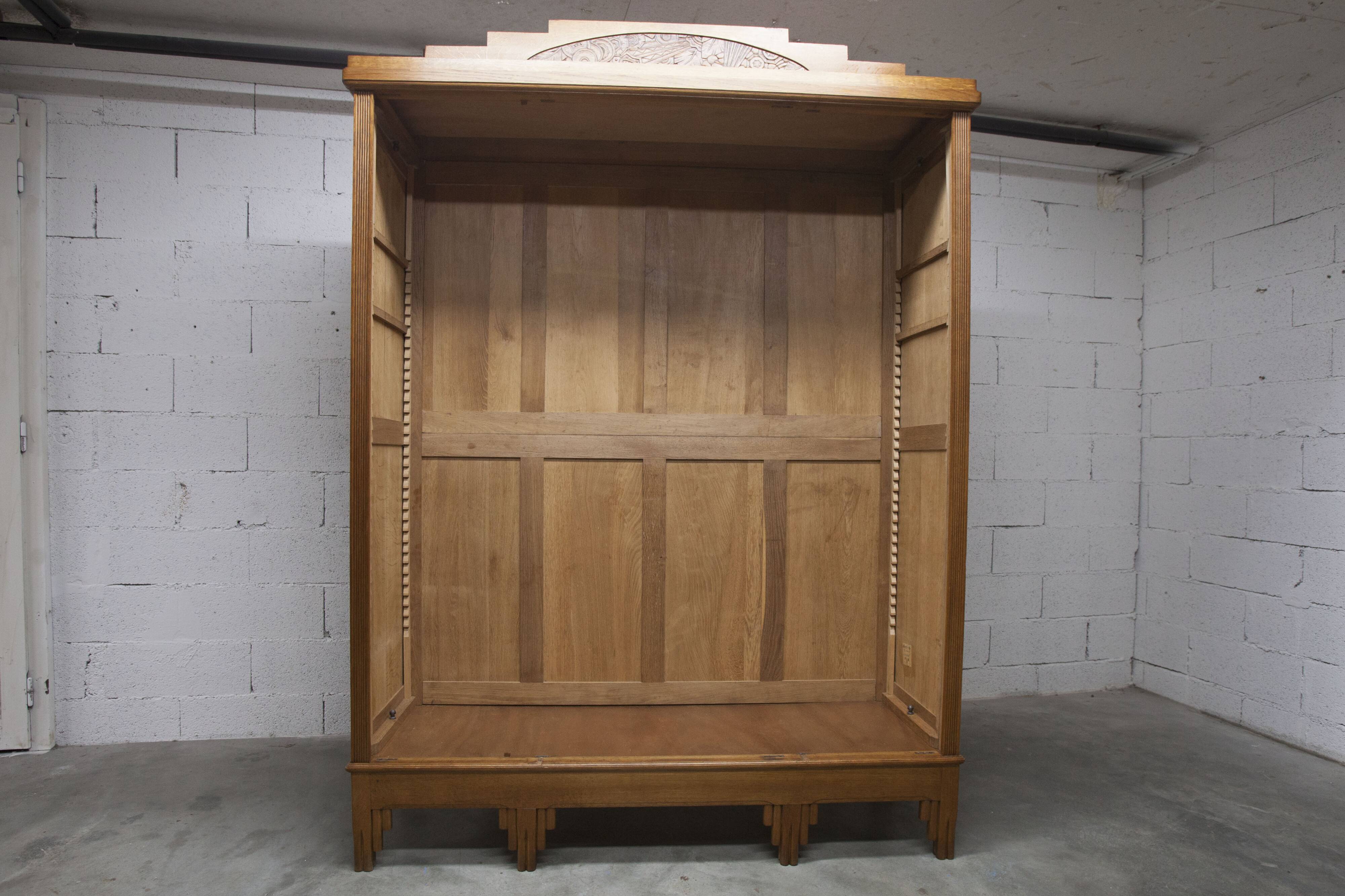 Art Deco carved oak wardrobe - Flemish workshop circa 1930