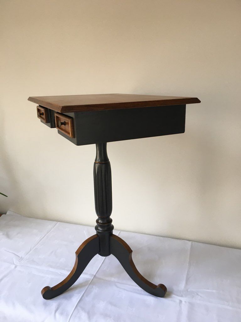 Pedestal table with drawers