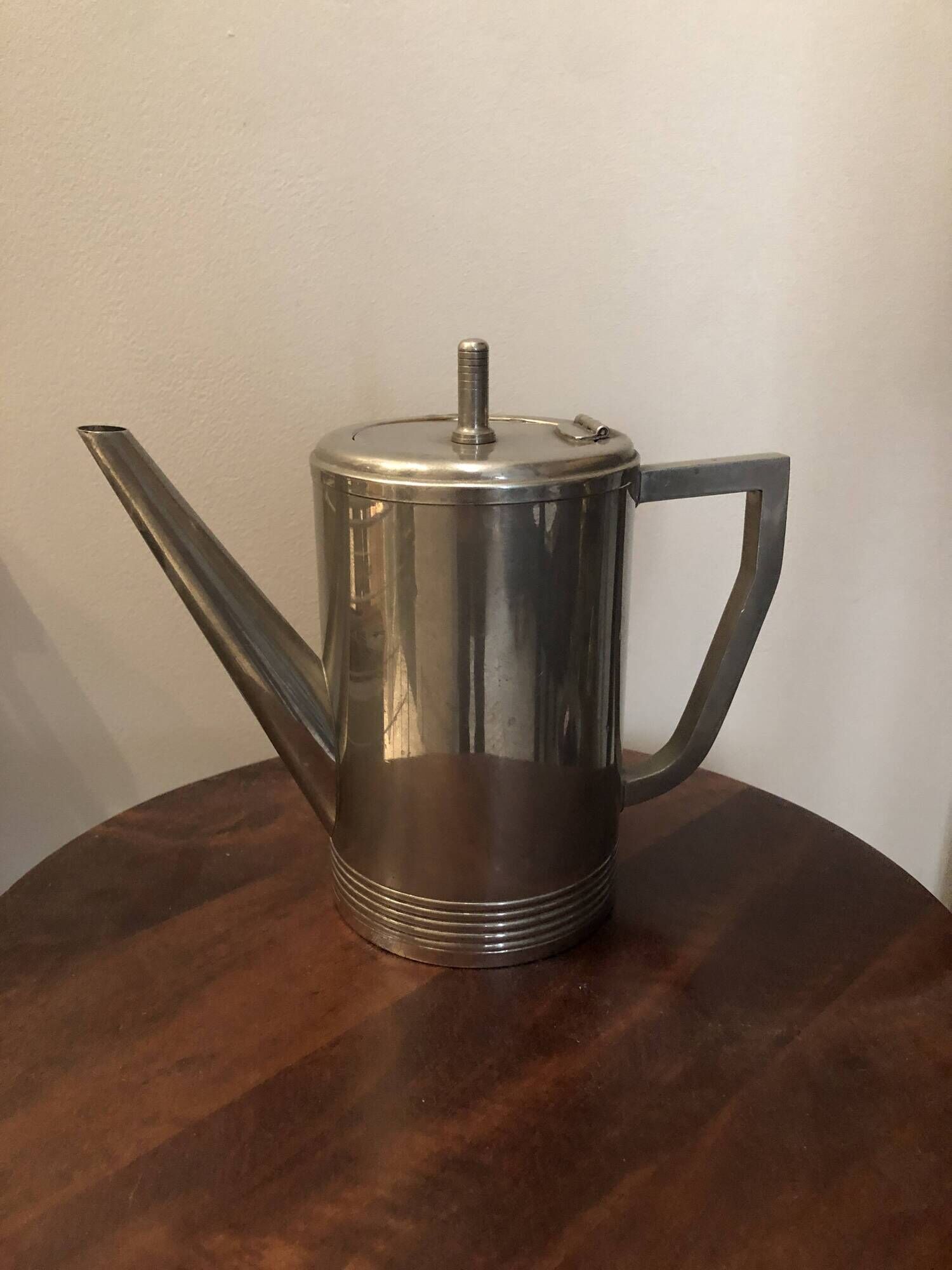 Stainless steel teapot in Art Deco style