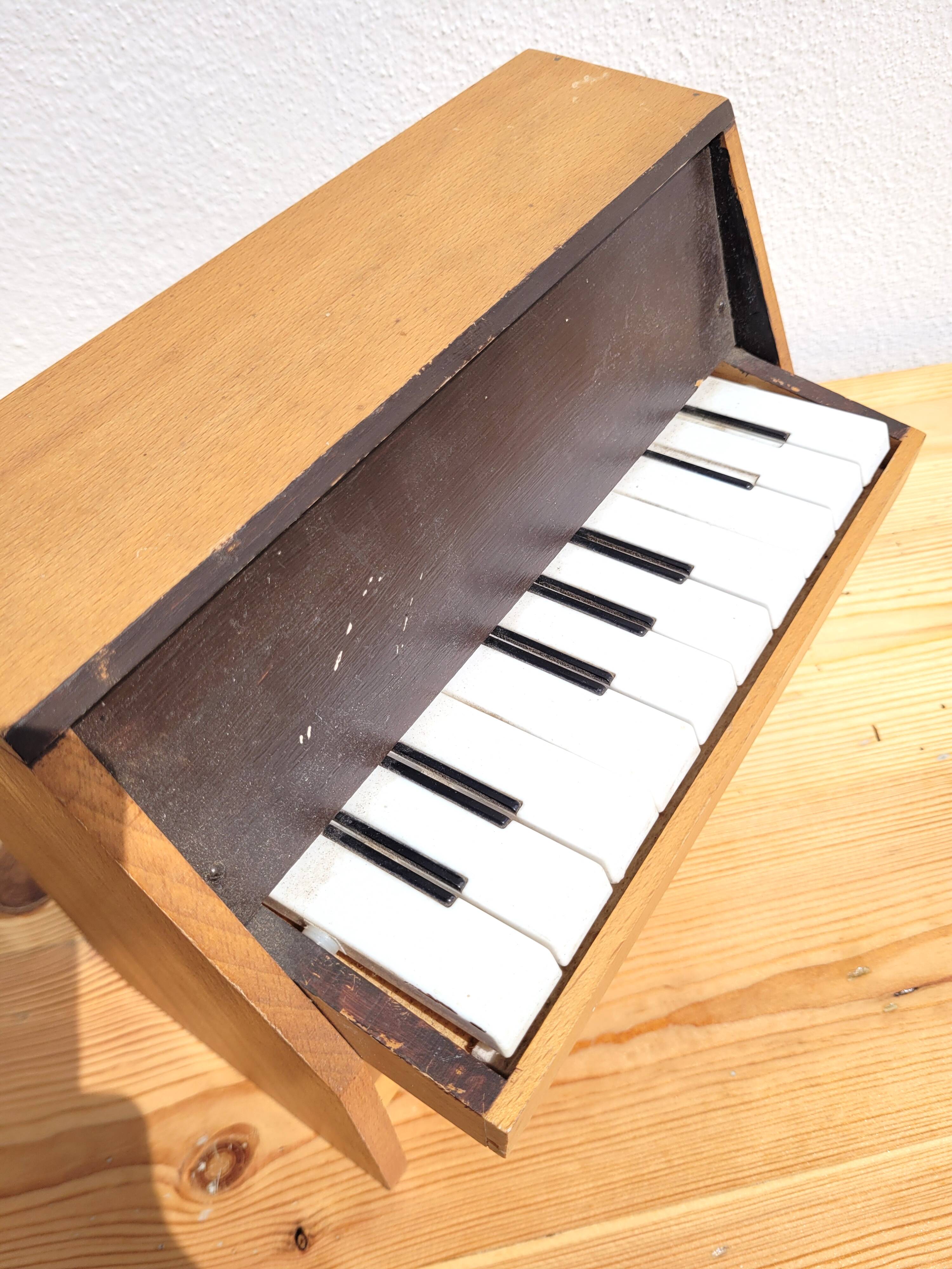 Vintage miniature toy piano