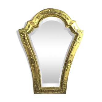 Miroir ancien en bois et stuc doré avec miroir biseauté
