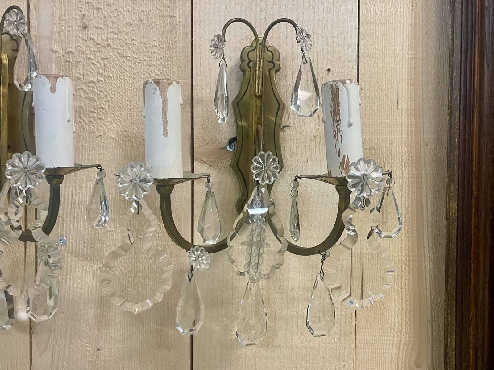 Pair of bronze sconces and pendants from the early 20th century