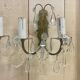 Pair of bronze sconces and pendants from the early 20th century