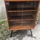 Vintage library showcase with 60s sliding doors