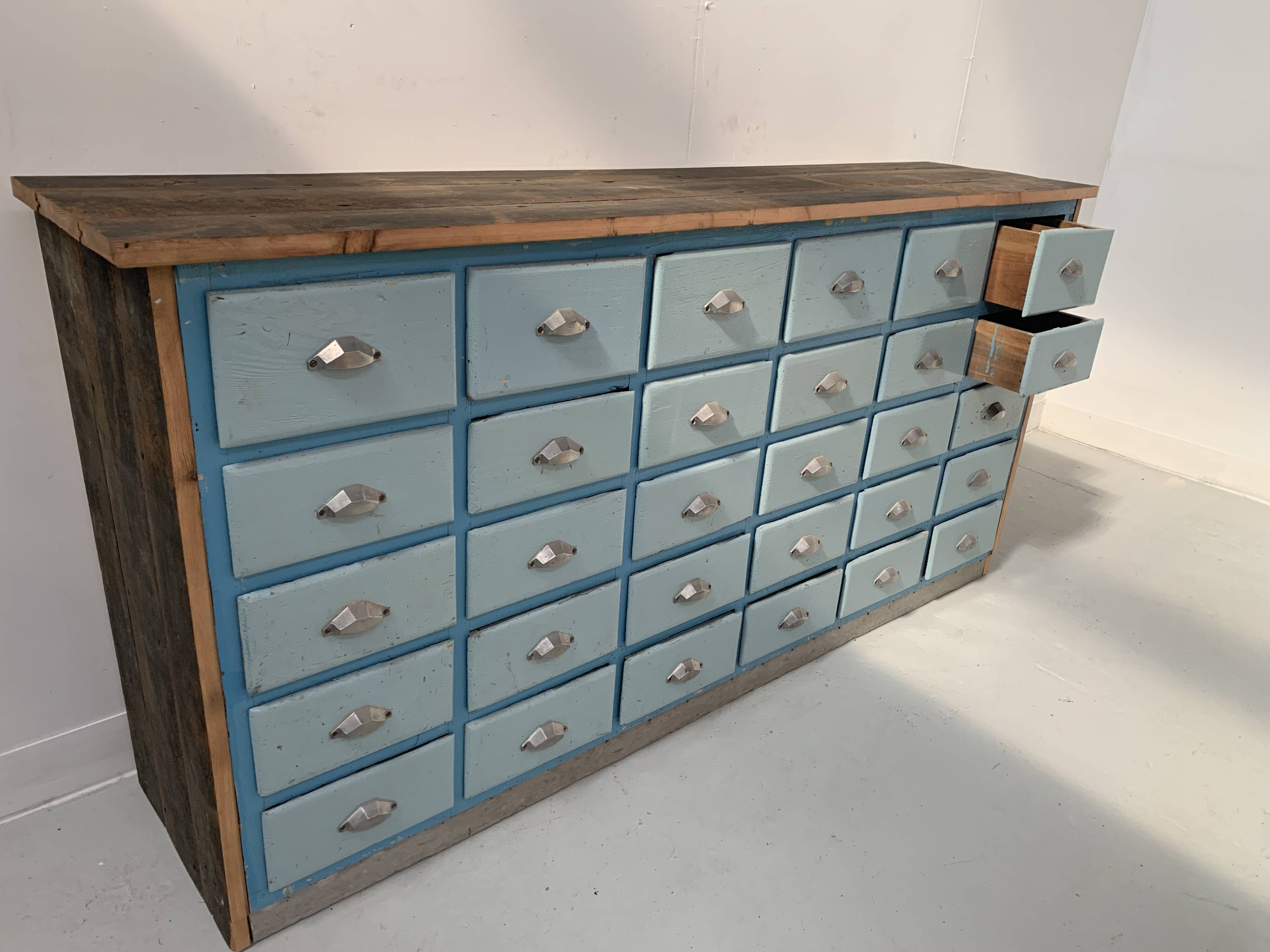 30-drawer storage unit in patinated fir, 20th century
