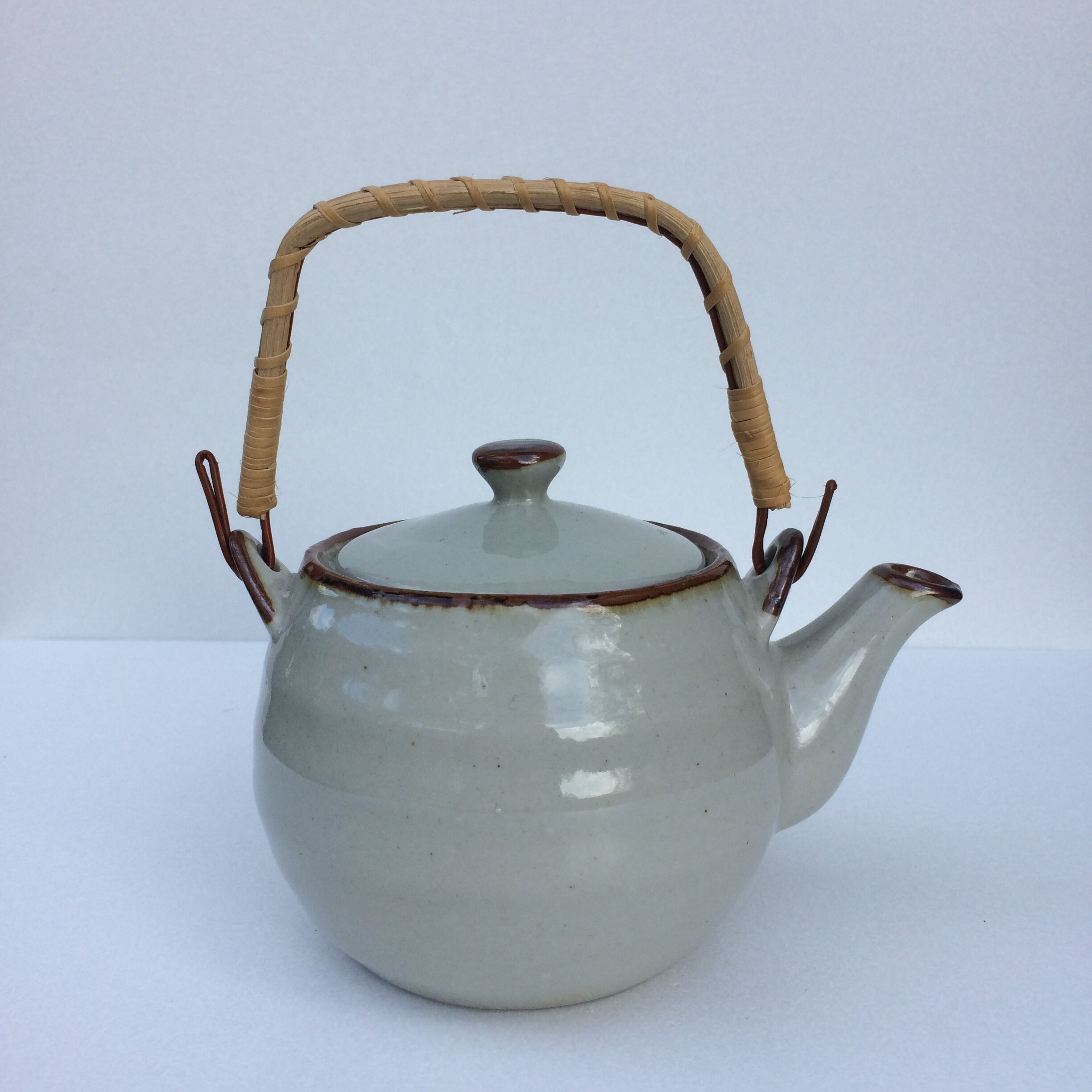 Vintage teapot wicker handle