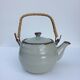 Vintage teapot wicker handle