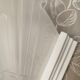 Pair of Art Deco wall sconces in plaster and pressed glass.