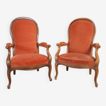 Deux fauteuils type Voltaire, en velours orange