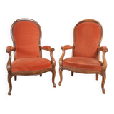 Two Voltaire type armchairs, in orange velvet