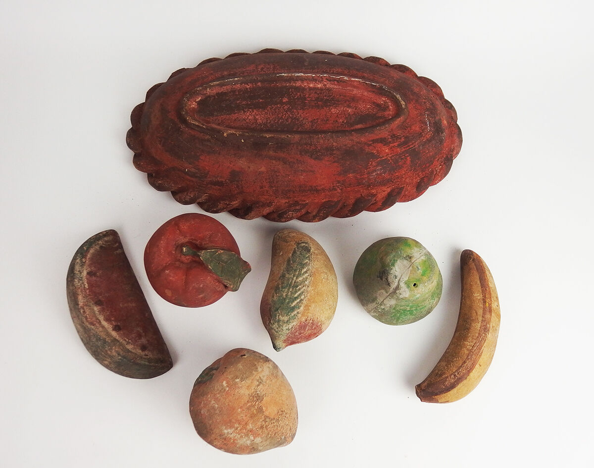 Basket and terracotta fruit