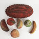 Basket and terracotta fruit