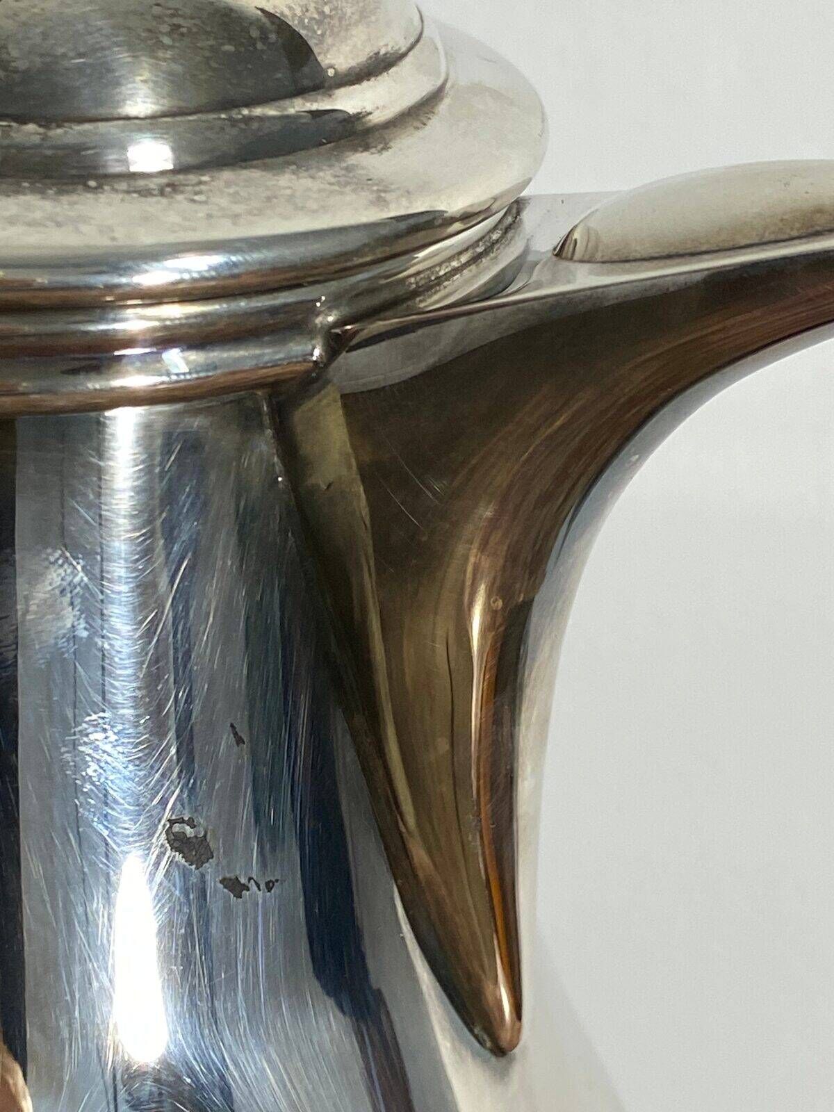 Saint Hilaire teapot in silver-plated metal, with a blackened handle.