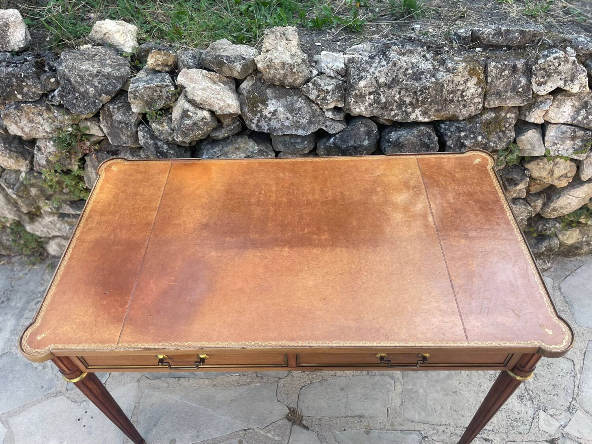 Louis XVI style mahogany flat desk from the late 19th century
