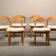 Henning Kjærnulf dining chairs set in Oak and Sheepskin, Denmark, 1960s