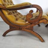 Pair of padded Chesterfield armchairs