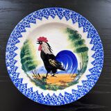 Old plate with rooster decoration