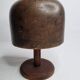 Old solid wood hat shape on foot, 1900