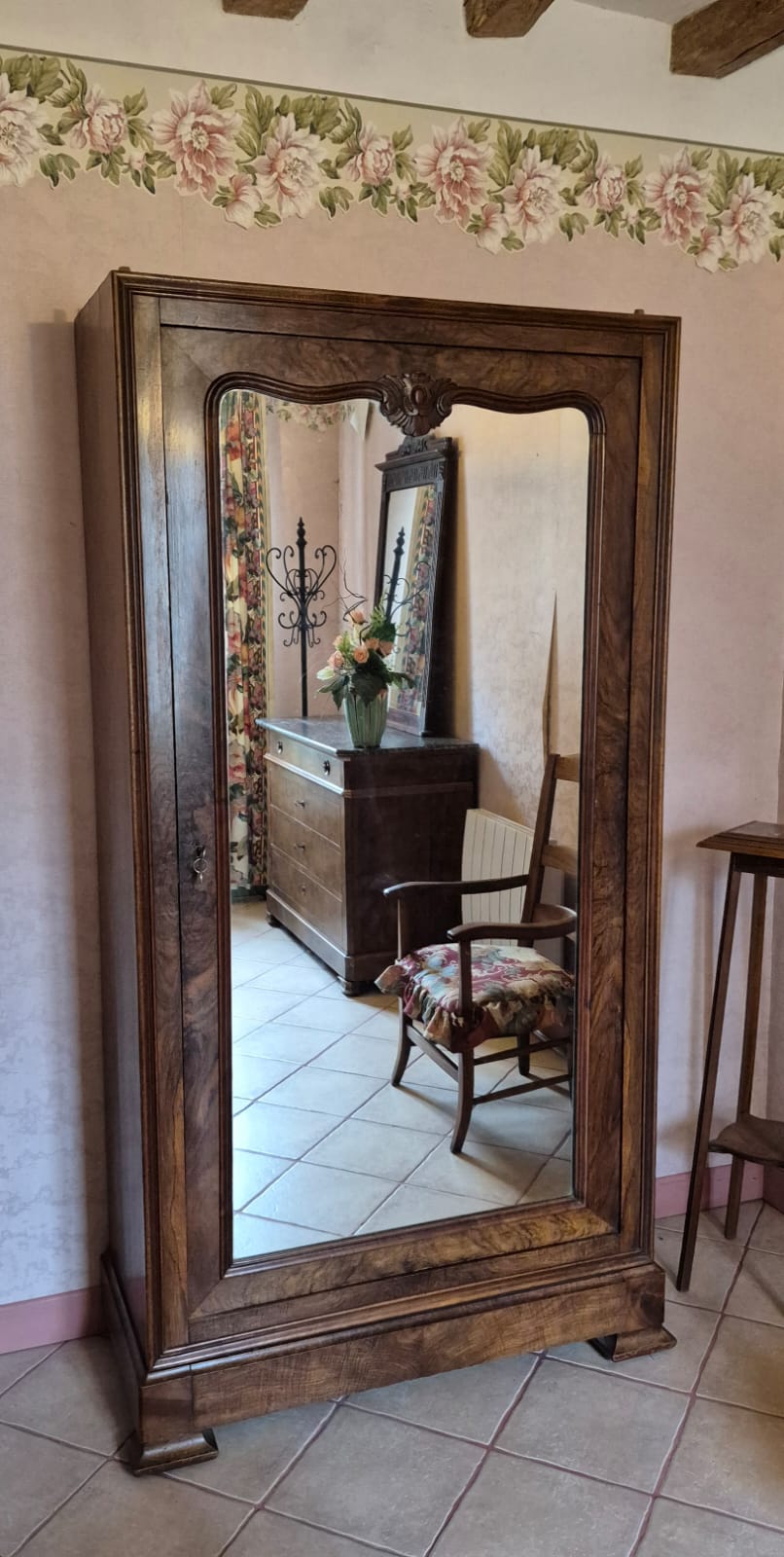 Antique wardrobe with one door and mirror.