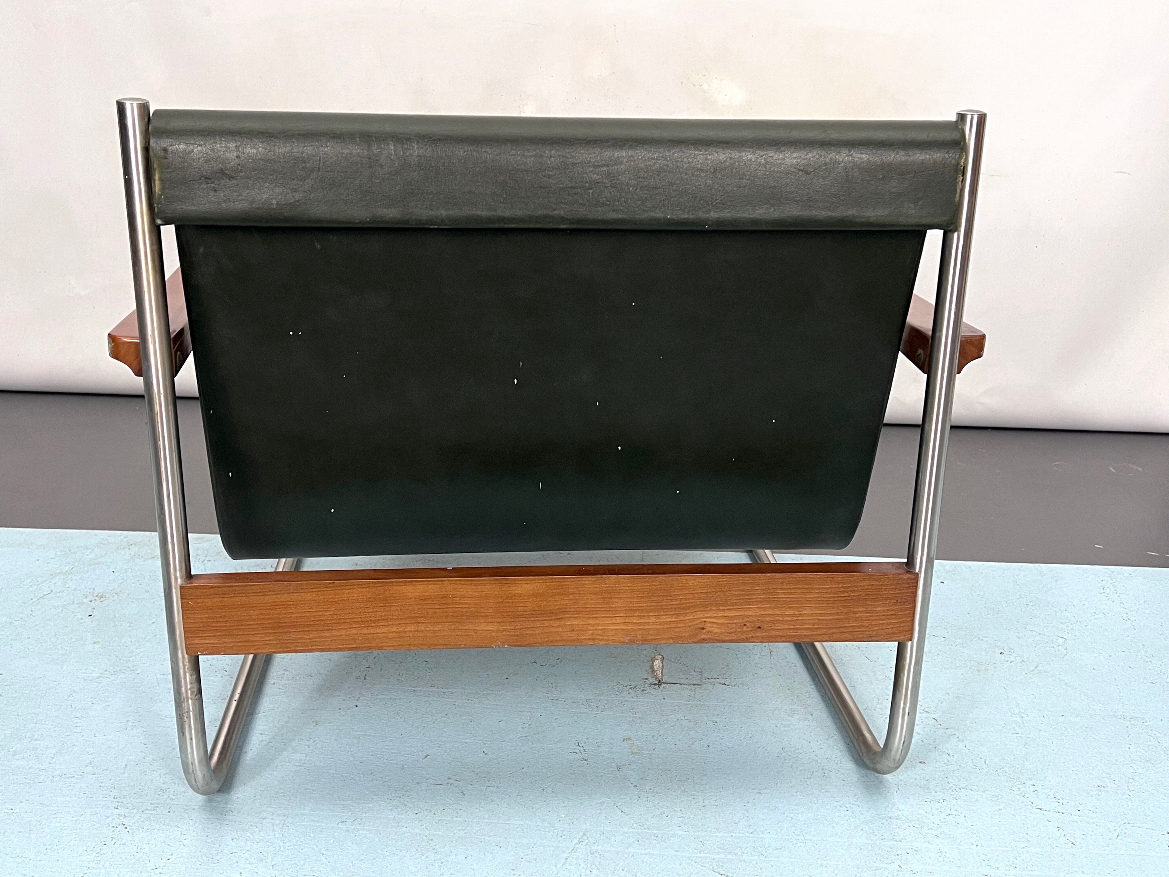 Fauteuil lounge vintage italien chrome et cuir des années 60