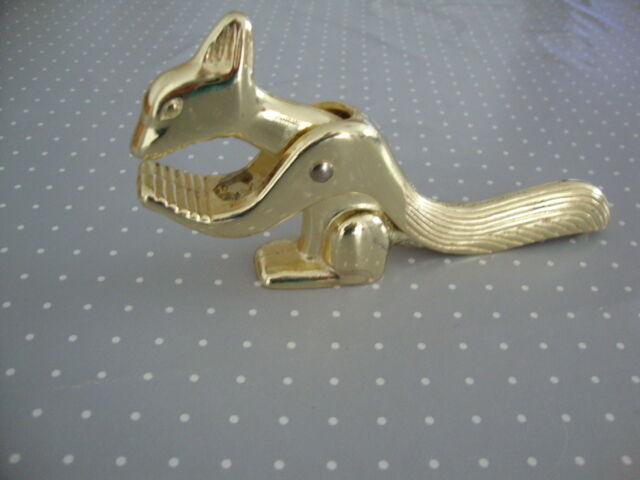 Nutcracker or hazelnuts vintage golden metal squirrel