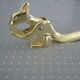 Nutcracker or hazelnuts vintage golden metal squirrel