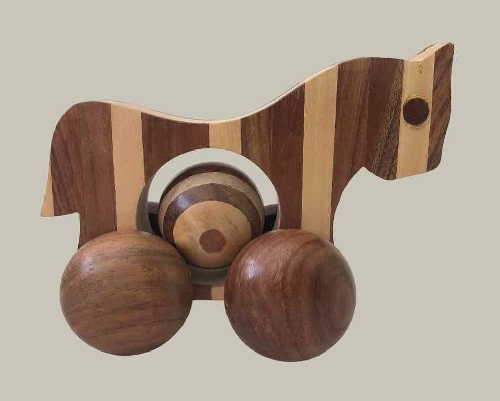 Small marquetry horse on wheels