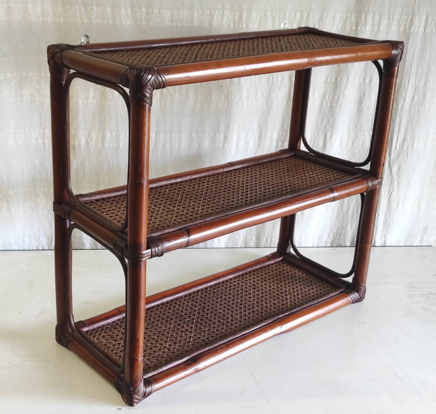 Rattan and cane wall shelf - late 20th century