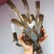 Vintage wall light with rush and leaves in sheet metal and gold metal