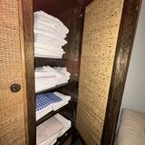 Rattan and wood wardrobe signed Roche Bobois