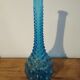 Bouteille vase bleu vintage verre moulé