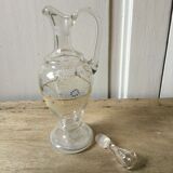 Antique decanter decorated by hand