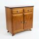Vintage Mado commode in terracotta and light oak, 1960s.