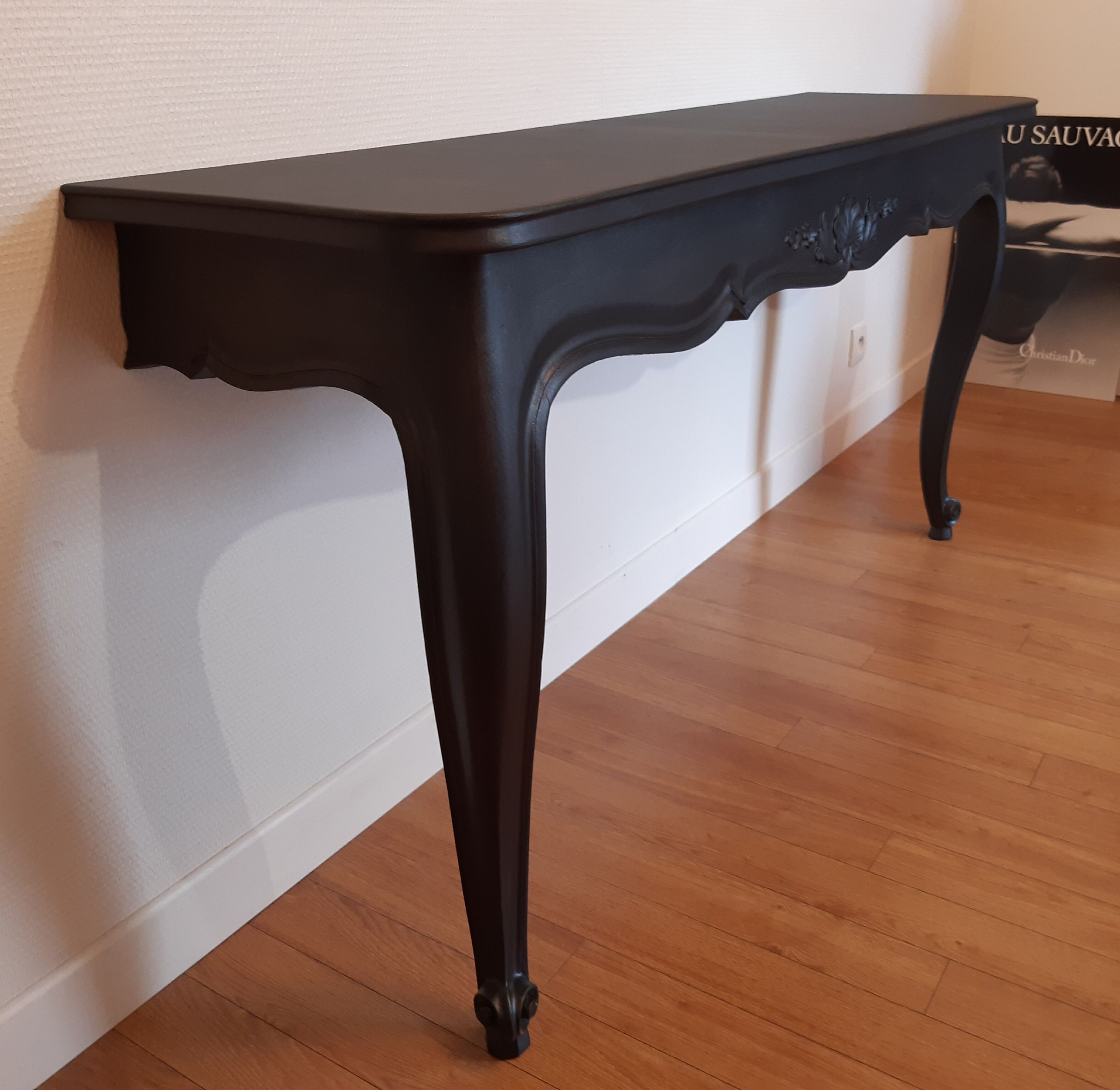 Louis XV-style black wall console