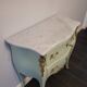 Commode de style Louis XV, galbée à 2 tiroirs